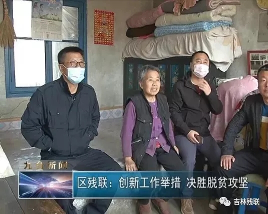 图为入户走访
